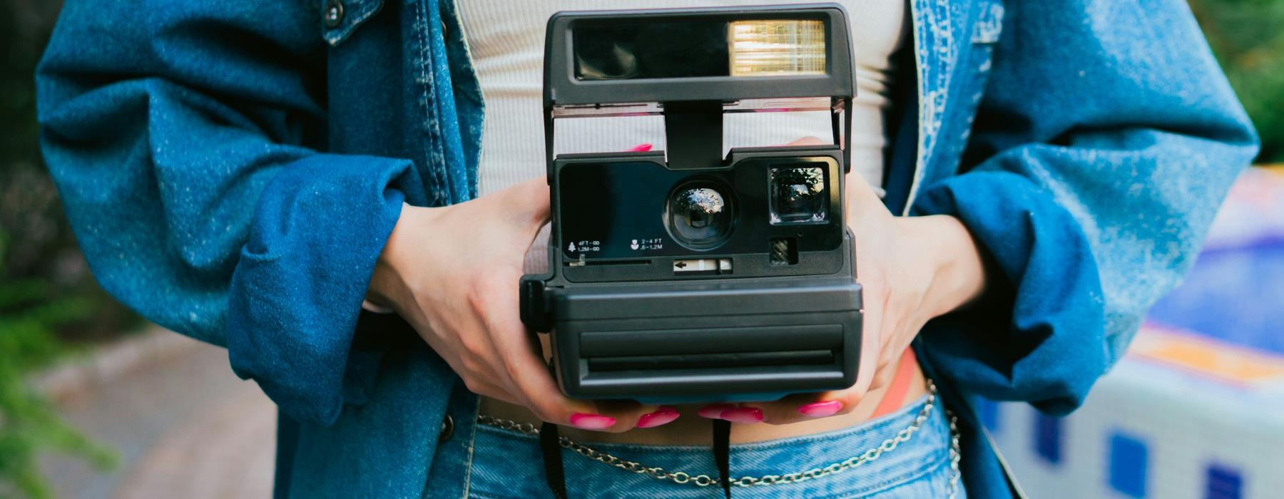 a person holding a camera