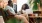 a man and a woman sitting at a table with a laptop